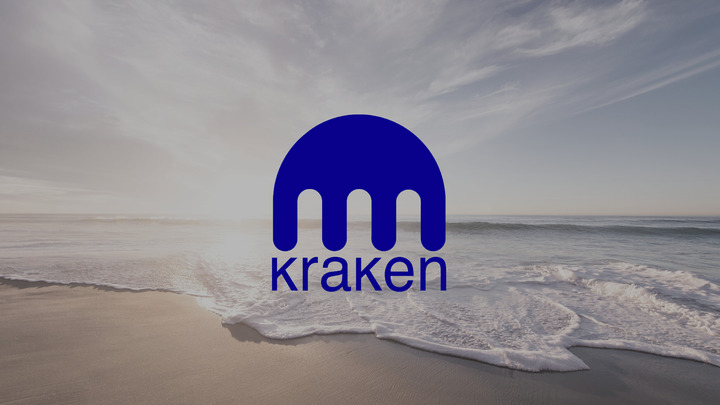 Kraken logo in front of the ocean
