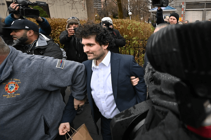 A photo of Sam Bankman-Fried being led out of the Manhattan Federal court