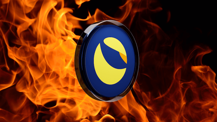A LUNC coin and flames in the background
