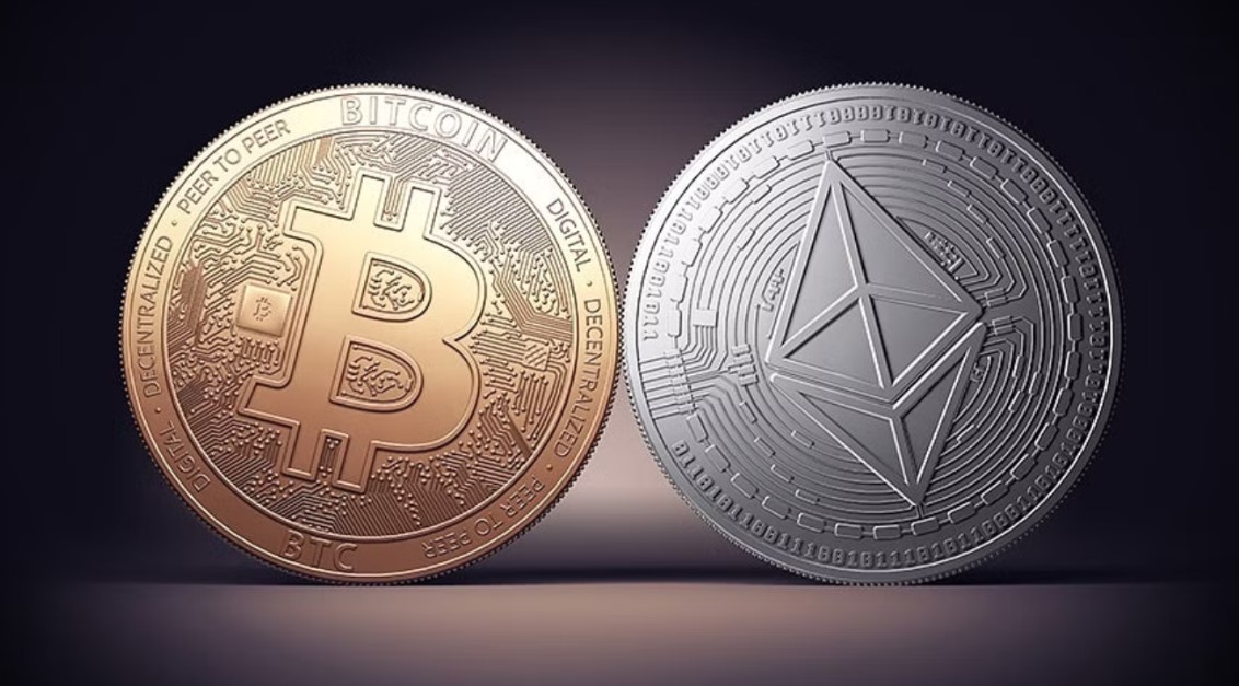 BTC and ETH coins standing together